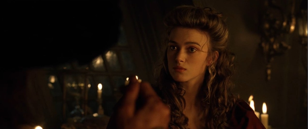 — Вы не знаете, что это такое? Верно?
— Пиратский медальон.
— Это ацтекское золото, одна из шестисот шестидесяти трёх бляшек, что индейцы отнесли Кортесу как выкуп... выкуп за кровь, доставленный с надеждой положить конец расправам. Но алчность Кортеса была неутолима, и тогда языческие боги придумали страшное проклятие. Любой из смертных, кто возьмёт хоть одну золотую бляшку, обречён на вечные муки.